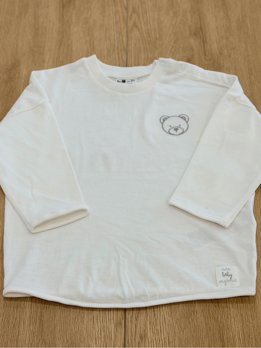 White Long-Sleeve Baby Tee with Grey Bear Detail
